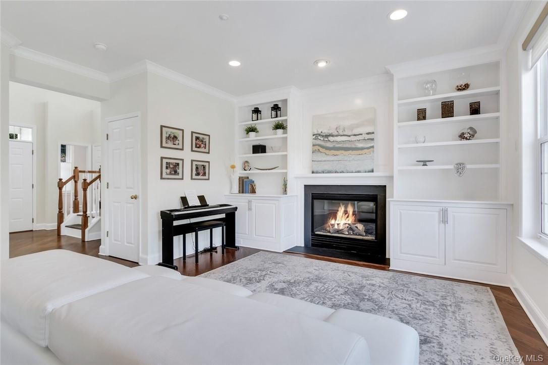 Bedroom, Fireplace, Interior, Piano, Recessed Lighting, Wood Texture Flooring