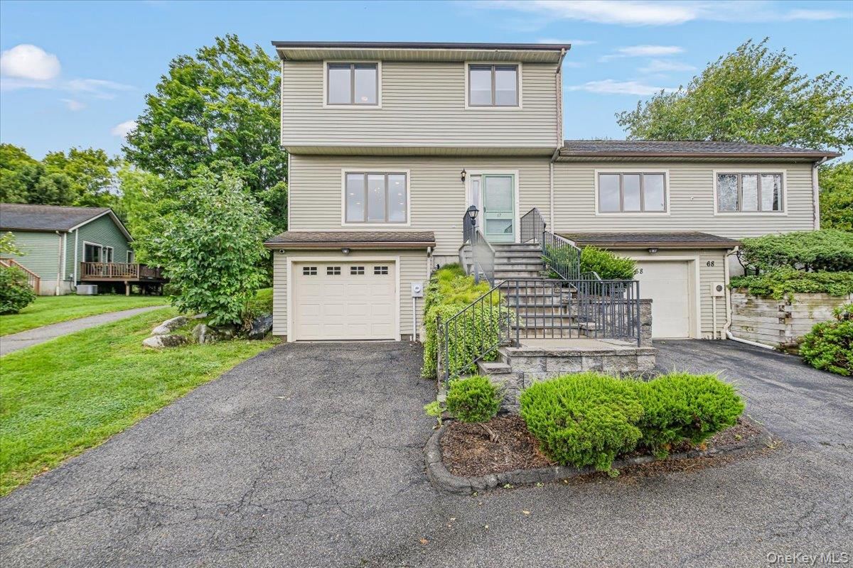 Attached, Exterior, Facade, Raised Ranch