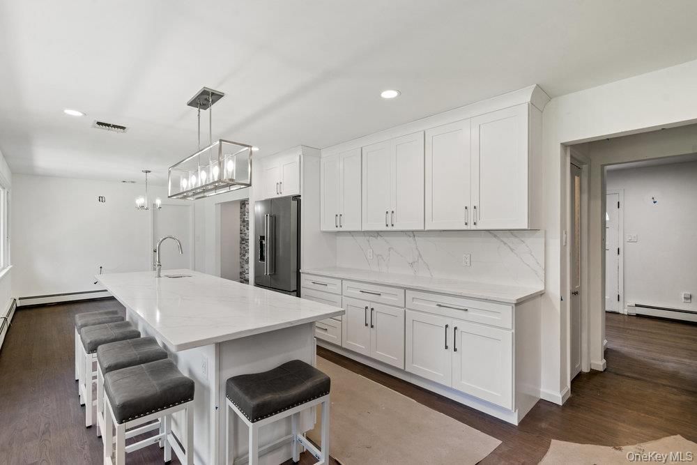 Interior, Kitchen, Marble Walls, Pendant Lights, Recessed Lighting, Wood Texture Flooring