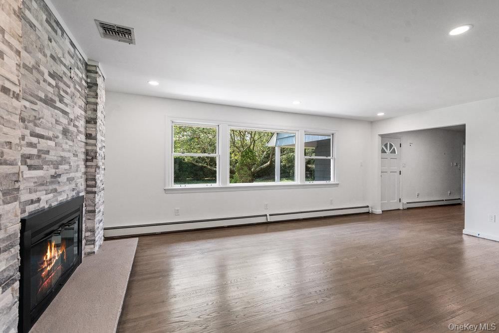 Empty room, Fireplace, Interior, Recessed Lighting, Wood Texture Flooring