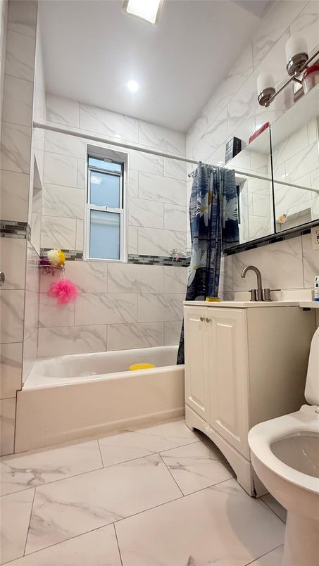 Bathroom, Dual Sink Vanities, Glass Shower, Interior, Marble, Marble Walls, Recessed Lighting