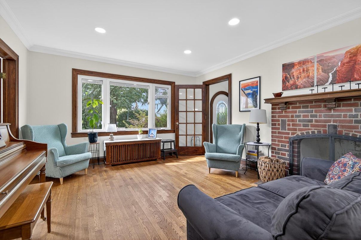 Fireplace, Home Office, Interior, Living room, Recessed Lighting, Stone Walls, Wood Texture Flooring
