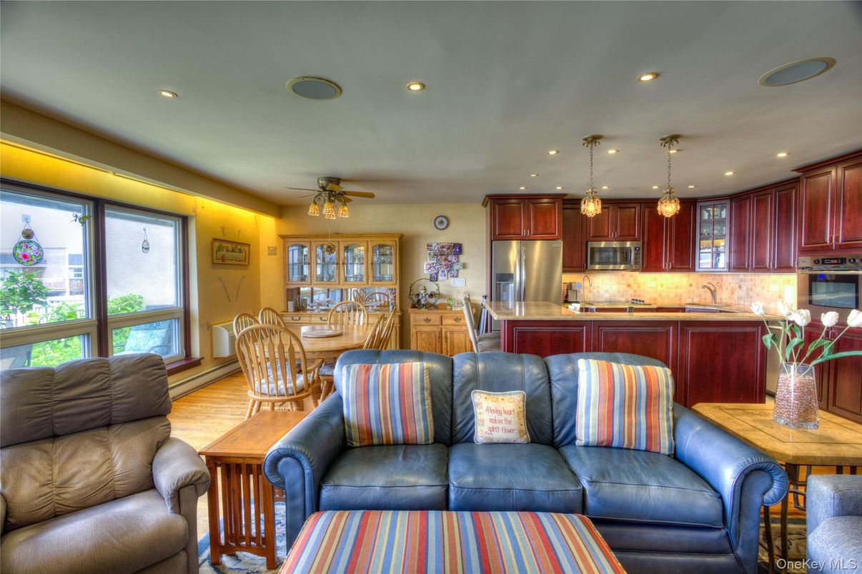 Dining room, Interior, Kitchen, Living room, Pendant Lights, Recessed Lighting, Stainless Steel Appliances, Wood Texture Flooring