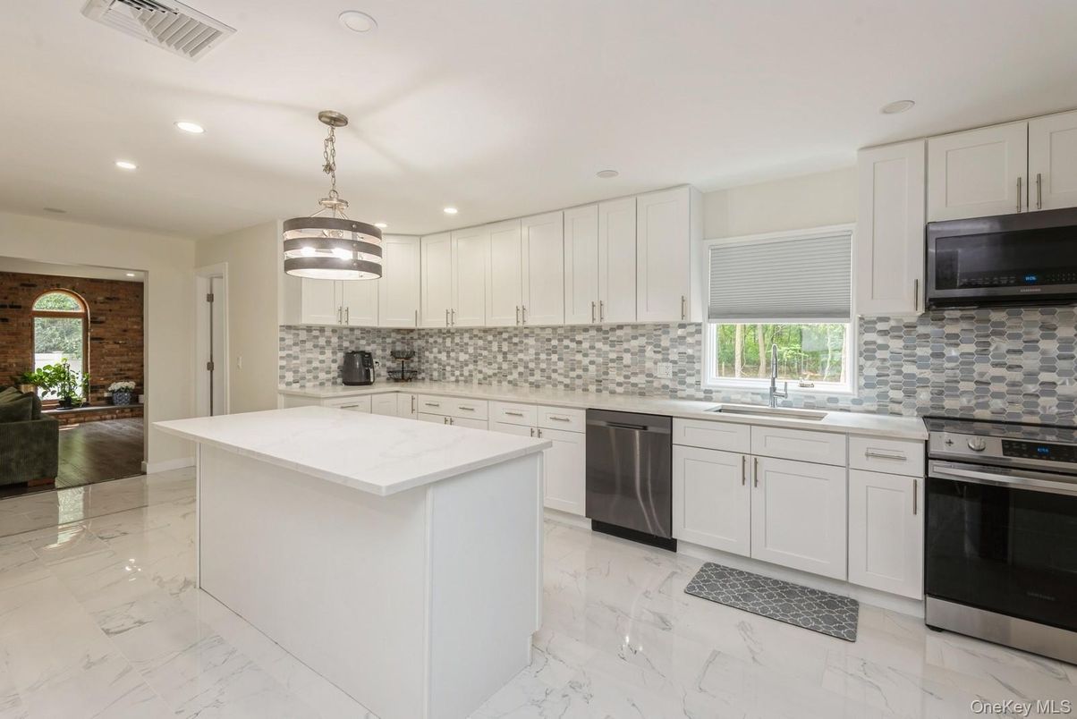 Interior, Kitchen, Marble, Pendant Lights, Recessed Lighting, Stainless Steel Appliances, Stone Walls