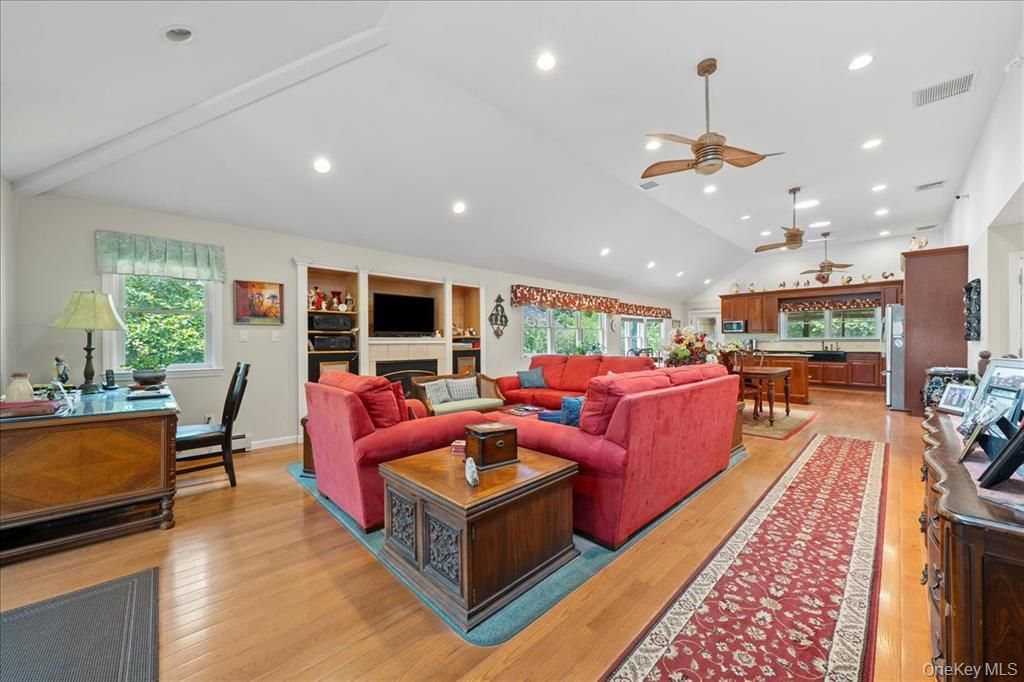 Dining room, Fireplace, Interior, Living room, Pendant Lights, Recessed Lighting, Wood Texture Flooring