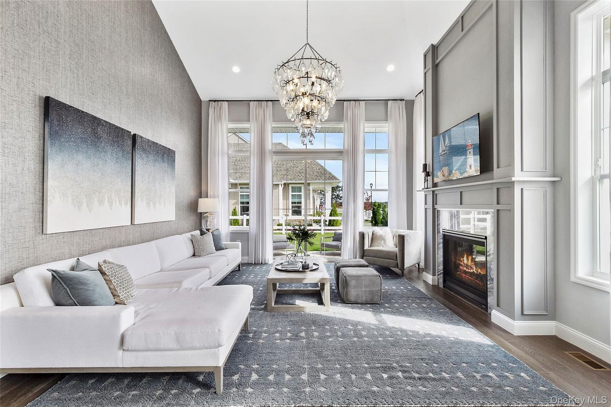 Chandelier, Fireplace, Interior, Living room, Recessed Lighting, Wood Texture Flooring