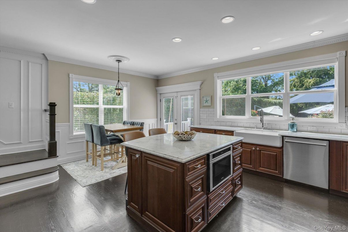 Dining room, Interior, Kitchen, Pendant Lights, Recessed Lighting, Stainless Steel Appliances, Wood Texture Flooring