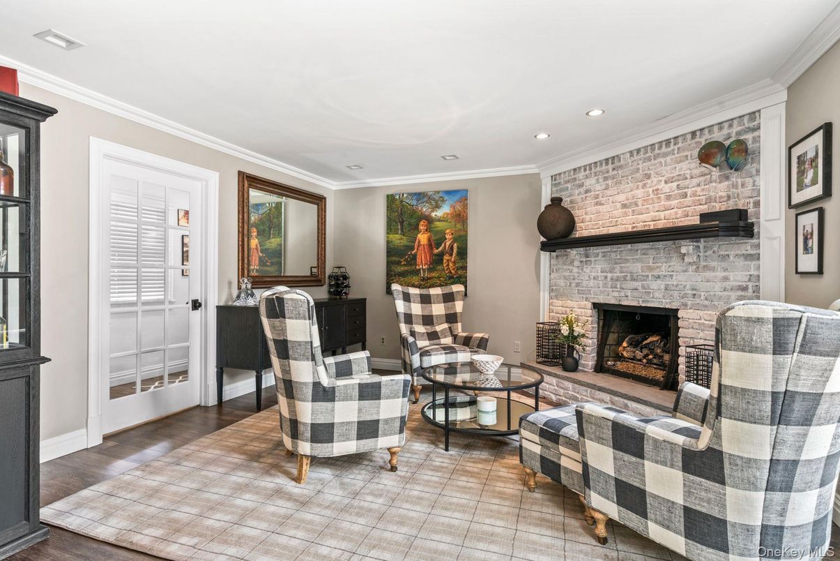 Fireplace, Interior, Living room, Recessed Lighting, Stone Walls, Wood Texture Flooring