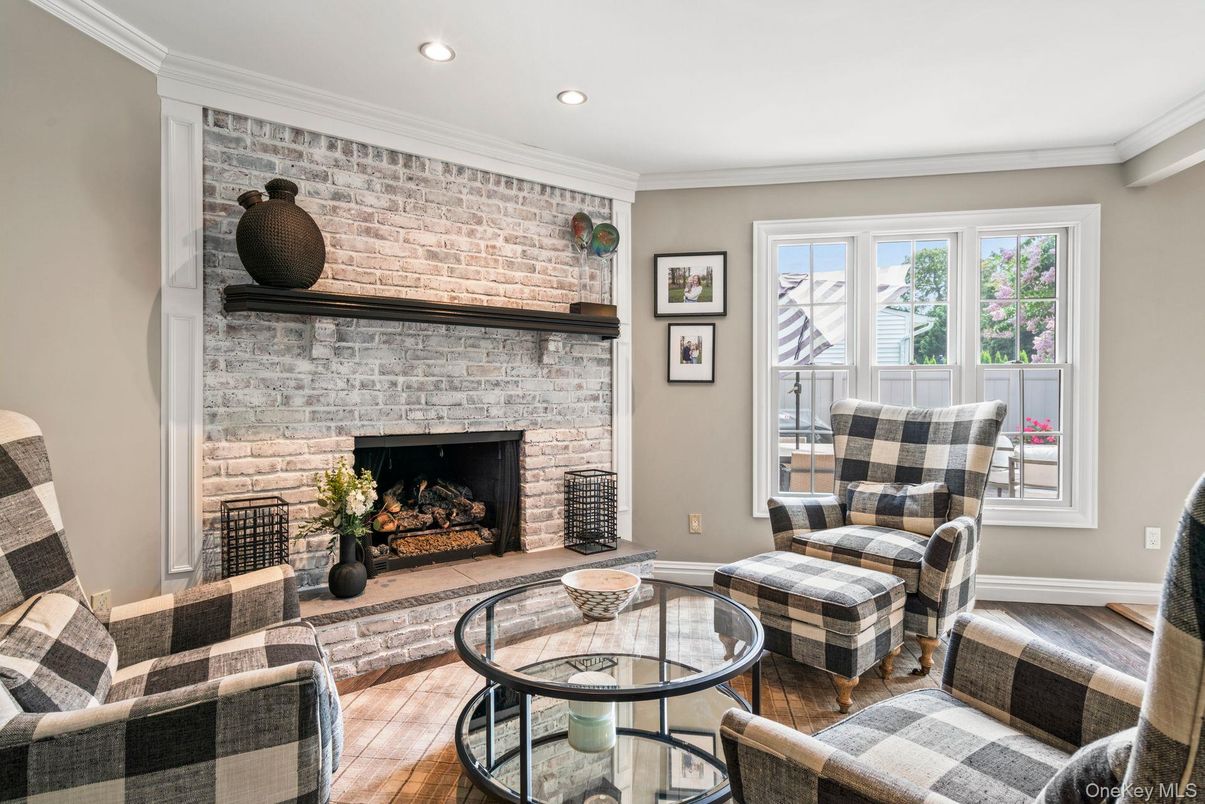 Fireplace, Interior, Living room, Recessed Lighting, Stone Walls, Wood Texture Flooring