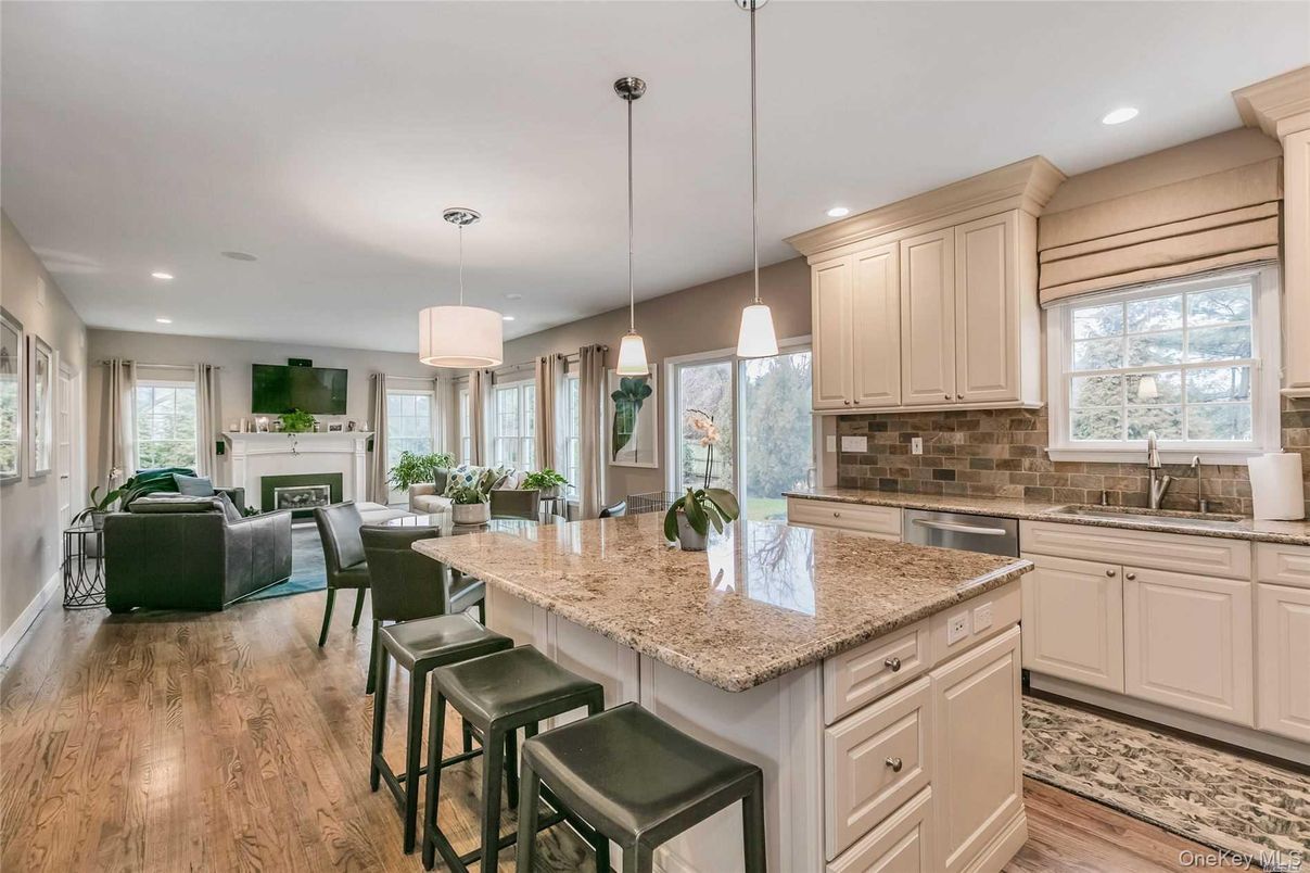 Dining room, Fireplace, Interior, Kitchen, Living room, Pendant Lights, Recessed Lighting, Wood Texture Flooring