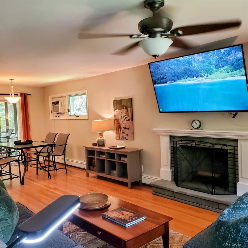 Dining room, Fireplace, Interior, Pendant Lights, Wood Texture Flooring