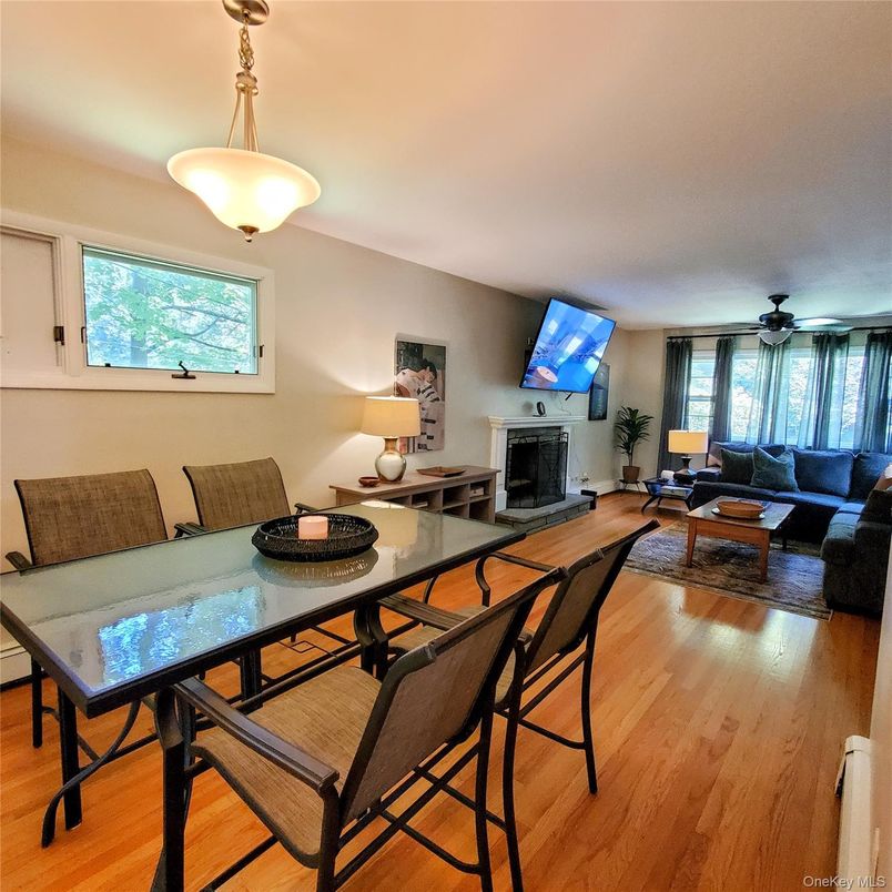Dining room, Fireplace, Interior, Living room, Pendant Lights, Wood Texture Flooring