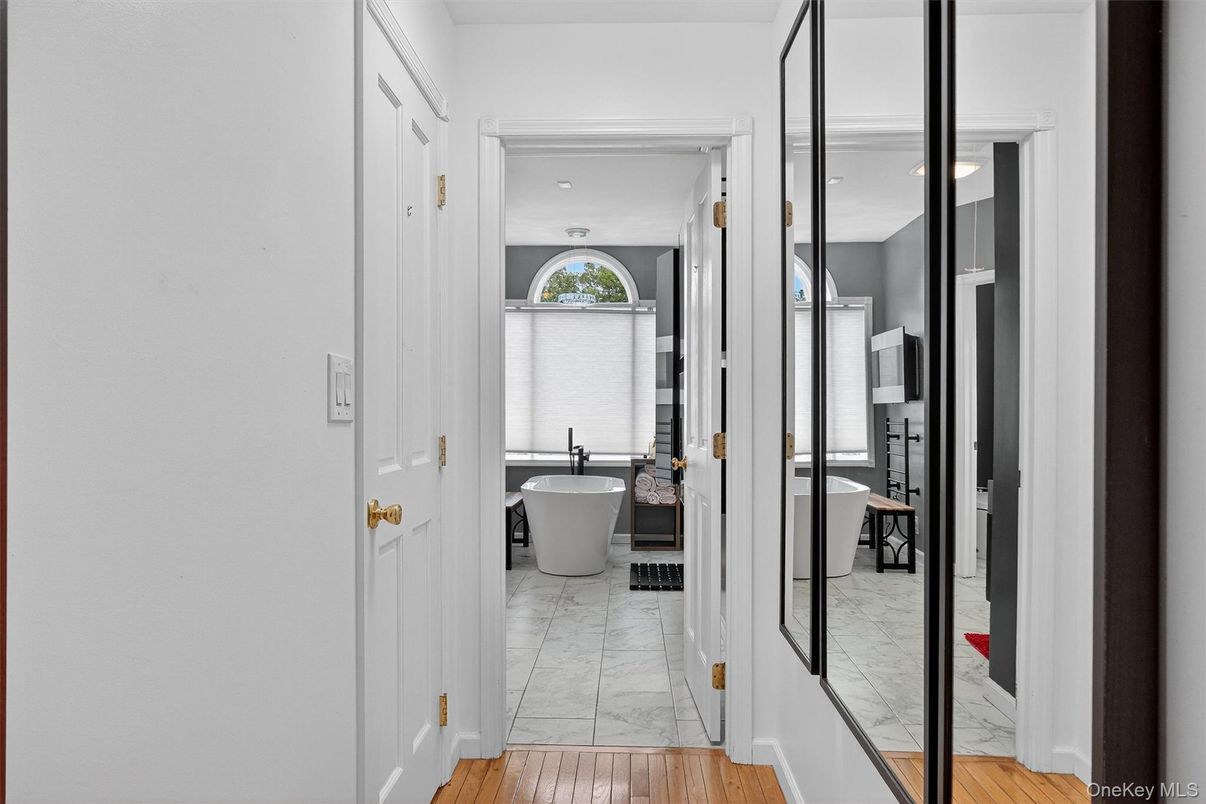 Bathroom, Free Standing Baths, Interior, Marble, Recessed Lighting, Wood Texture Flooring