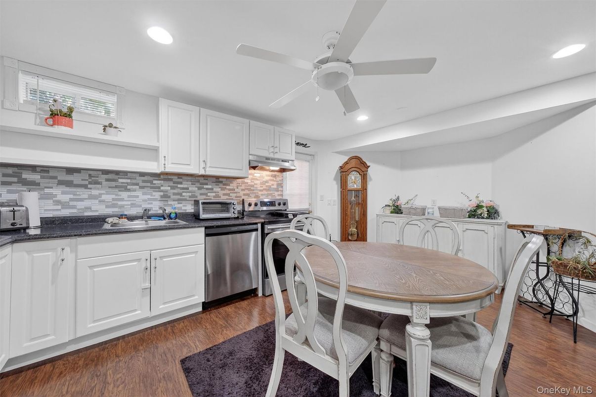 Dining room, Interior, Kitchen, Recessed Lighting, Stainless Steel Appliances, Wood Texture Flooring