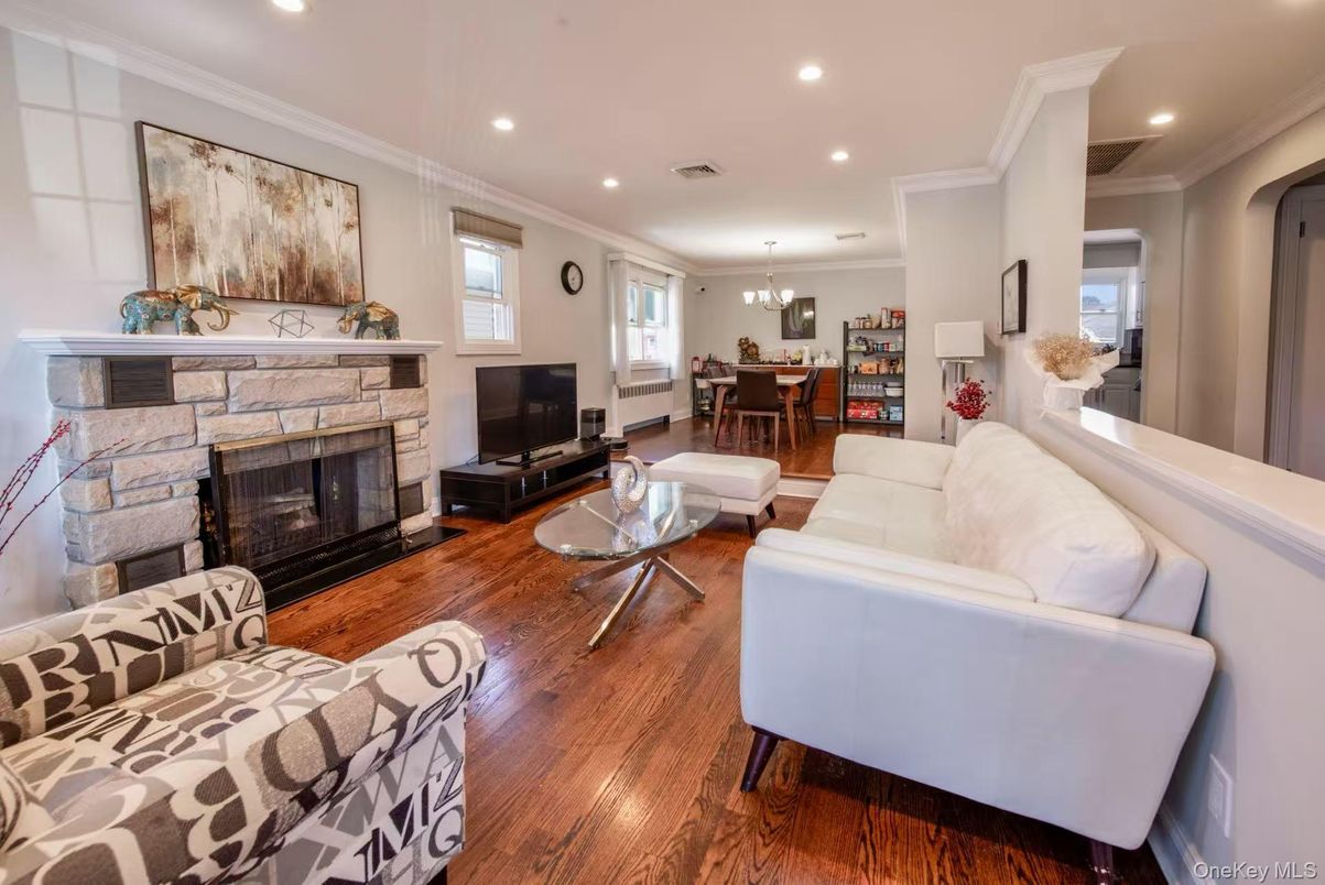 Chandelier, Dining room, Fireplace, Interior, Living room, Recessed Lighting, Wood Texture Flooring