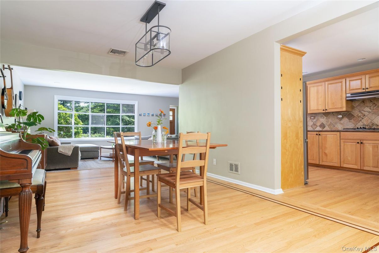 Dining room, Interior, Kitchen, Pendant Lights, Piano, Recessed Lighting, Wood Texture Flooring
