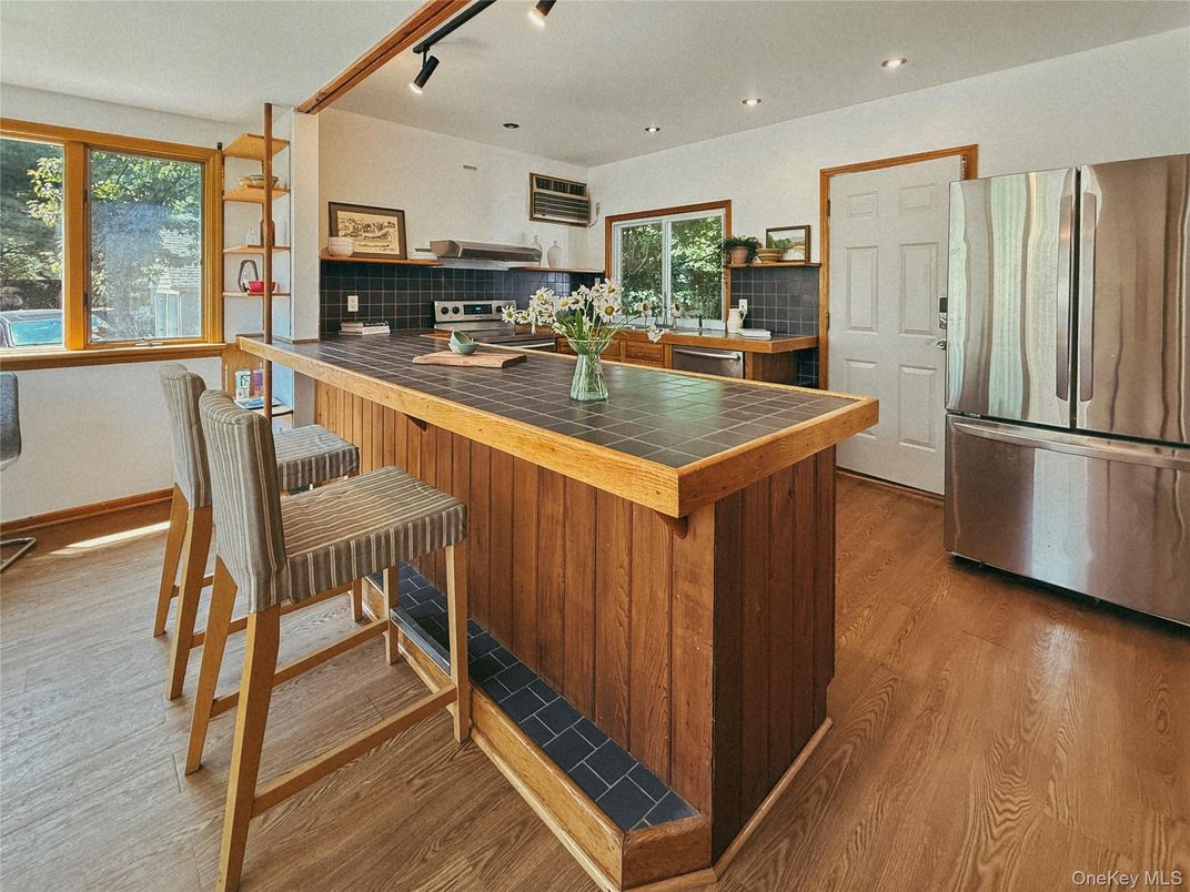 Interior, Kitchen, Recessed Lighting, Stainless Steel Appliances, Tile Countertops, Wood Texture Flooring