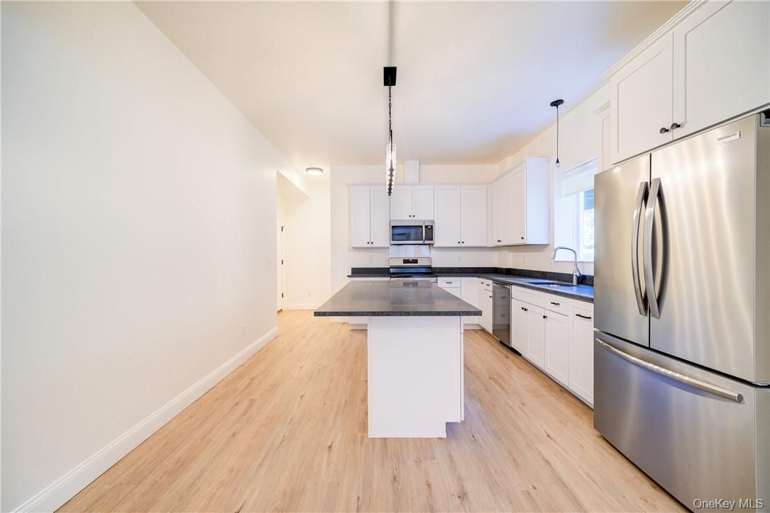 Interior, Kitchen, Pendant Lights, Stainless Steel Appliances, Wood Texture Flooring