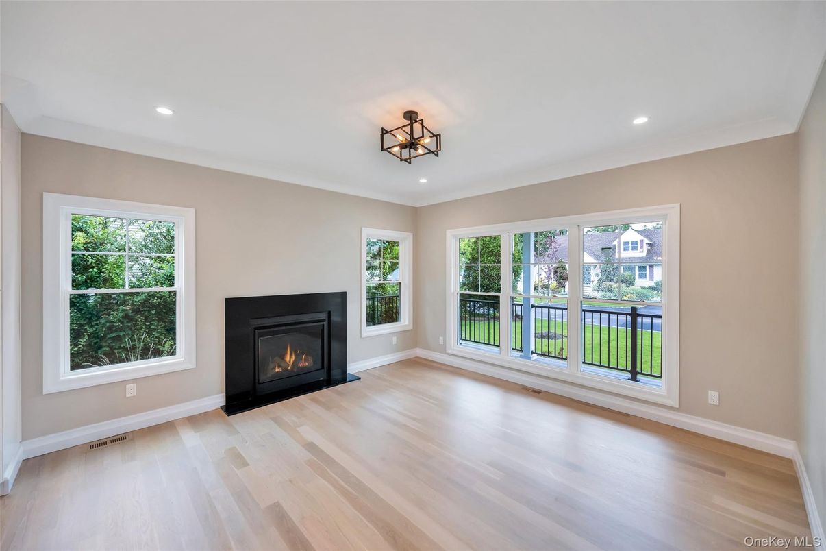 Empty room, Fireplace, Interior, Recessed Lighting, Wood Texture Flooring