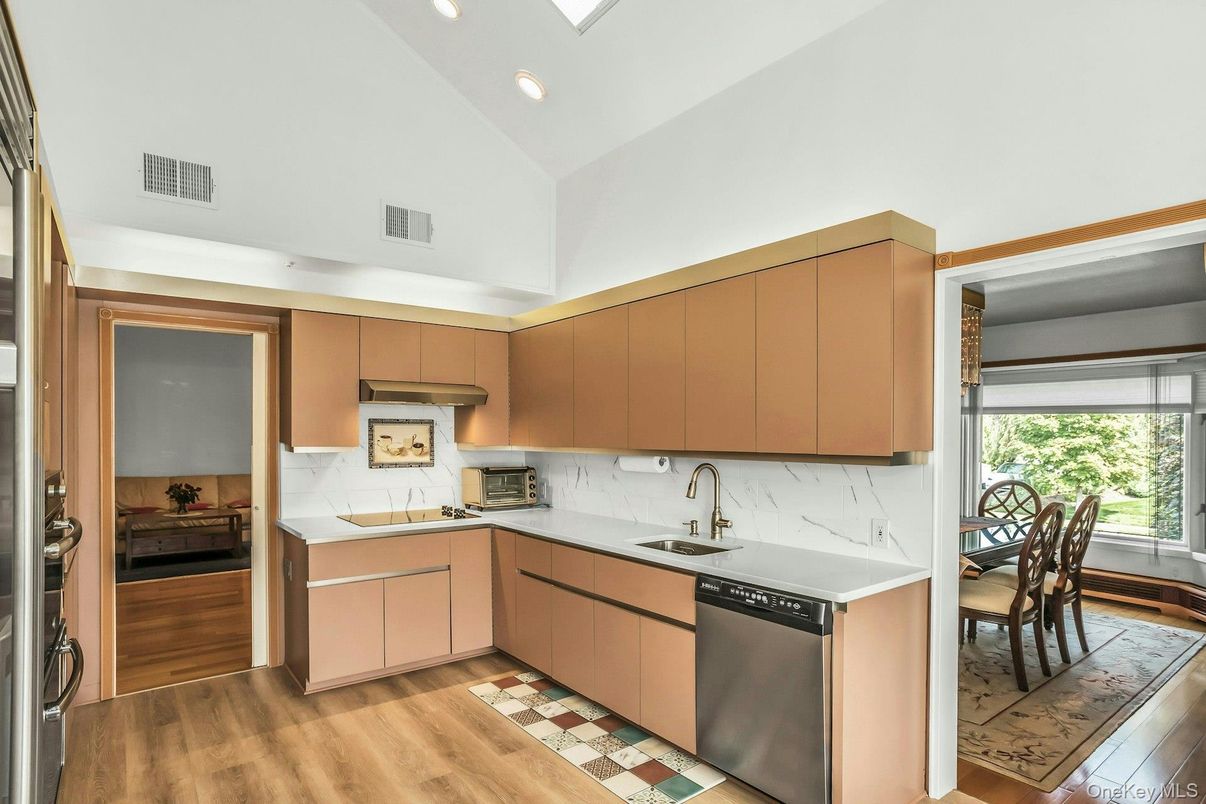 Dining room, Interior, Kitchen, Marble Walls, Recessed Lighting, Stainless Steel Appliances, Wood Texture Flooring