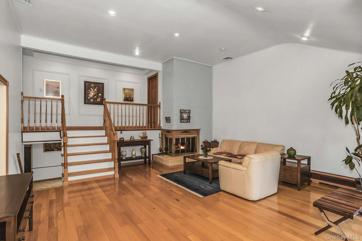 Fireplace, Interior, Living room, Recessed Lighting, Wood Texture Flooring