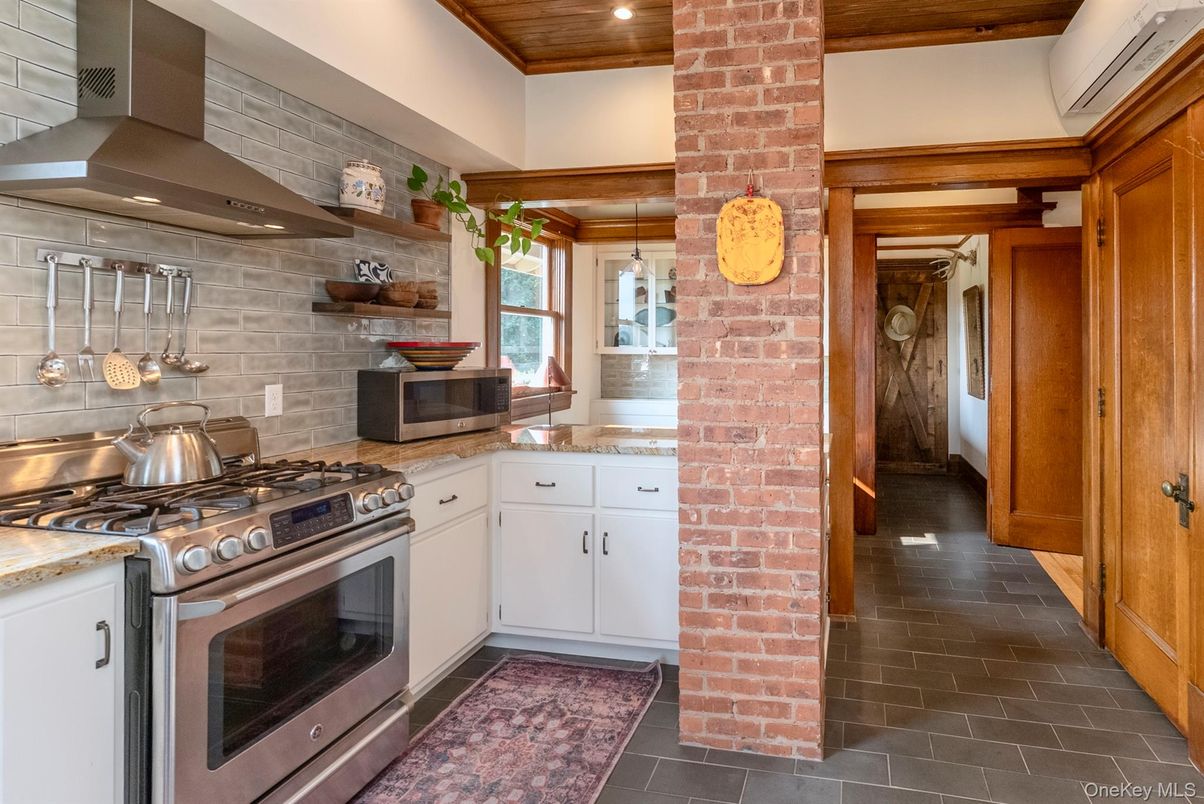 Interior, Kitchen, Recessed Lighting, Stainless Steel Appliances, Stone Walls