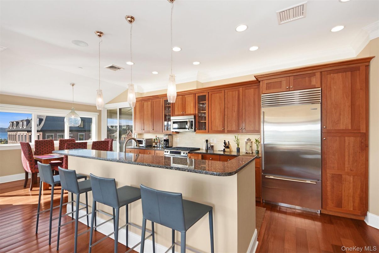 Dining room, Interior, Kitchen, Pendant Lights, Recessed Lighting, Stainless Steel Appliances, Wood Texture Flooring