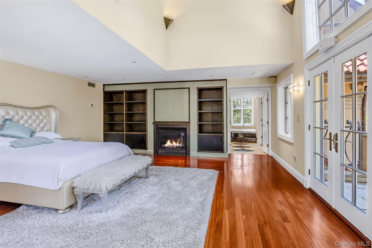 Bedroom, Fireplace, Interior, Recessed Lighting, Wood Texture Flooring
