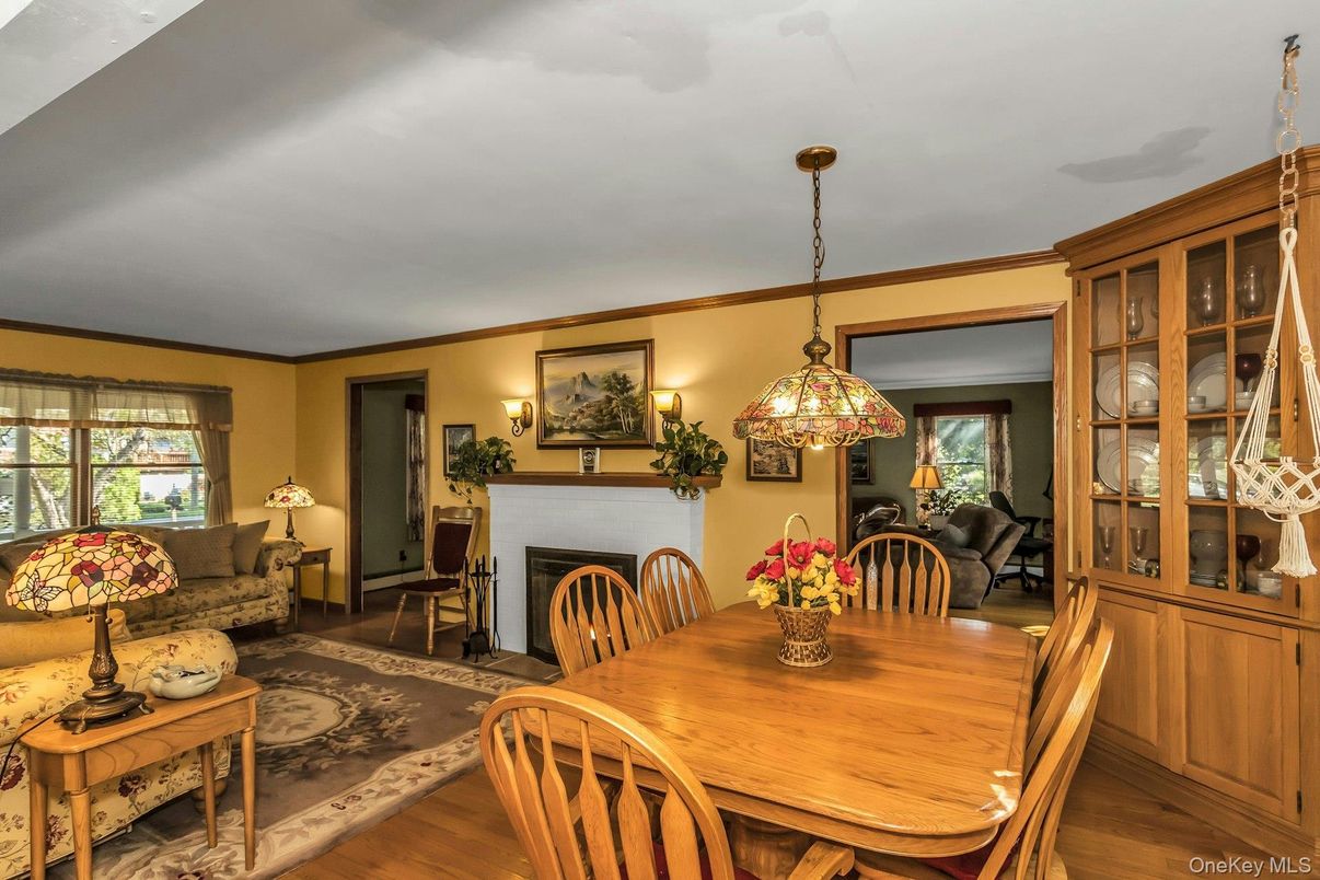 Dining room, Fireplace, Interior, Pendant Lights, Wood Texture Flooring