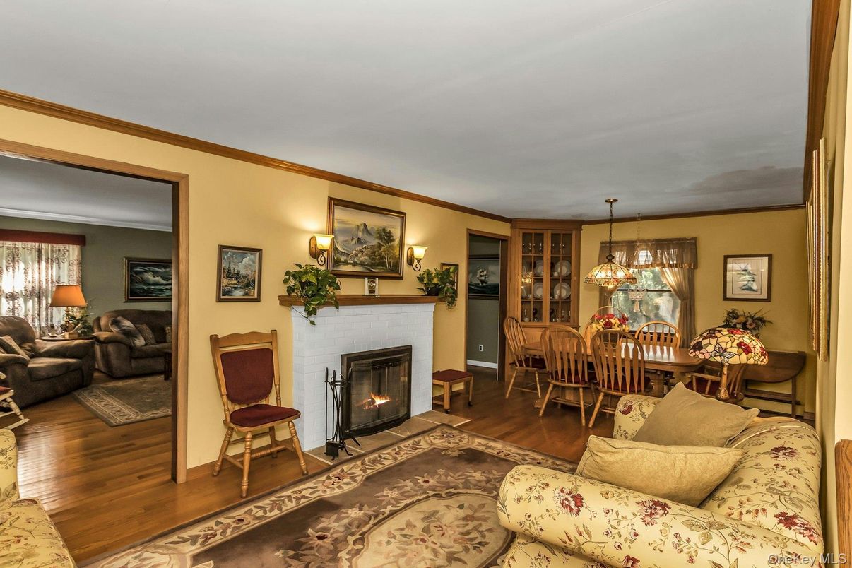 Dining room, Fireplace, Interior, Living room, Pendant Lights, Wood Texture Flooring