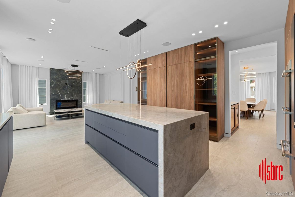 Dining room, Fireplace, Interior, Kitchen, Living room, Pendant Lights, Recessed Lighting, Wood Texture Flooring