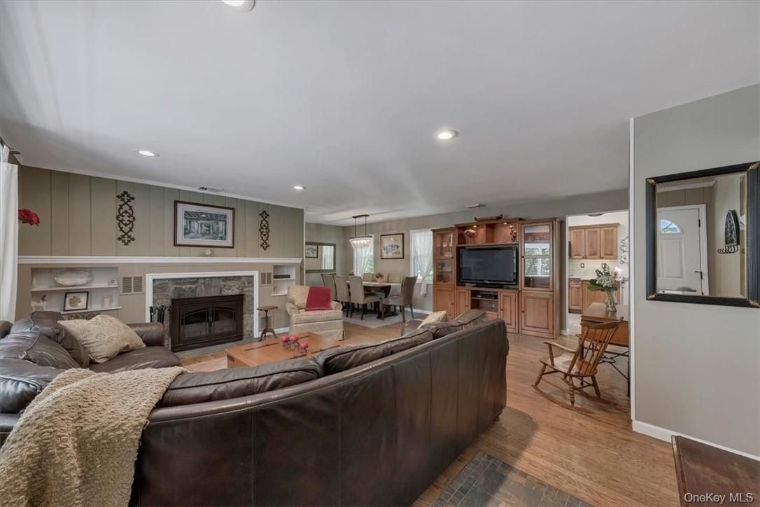 Dining room, Fireplace, Interior, Living room, Pendant Lights, Recessed Lighting, Wood Texture Flooring