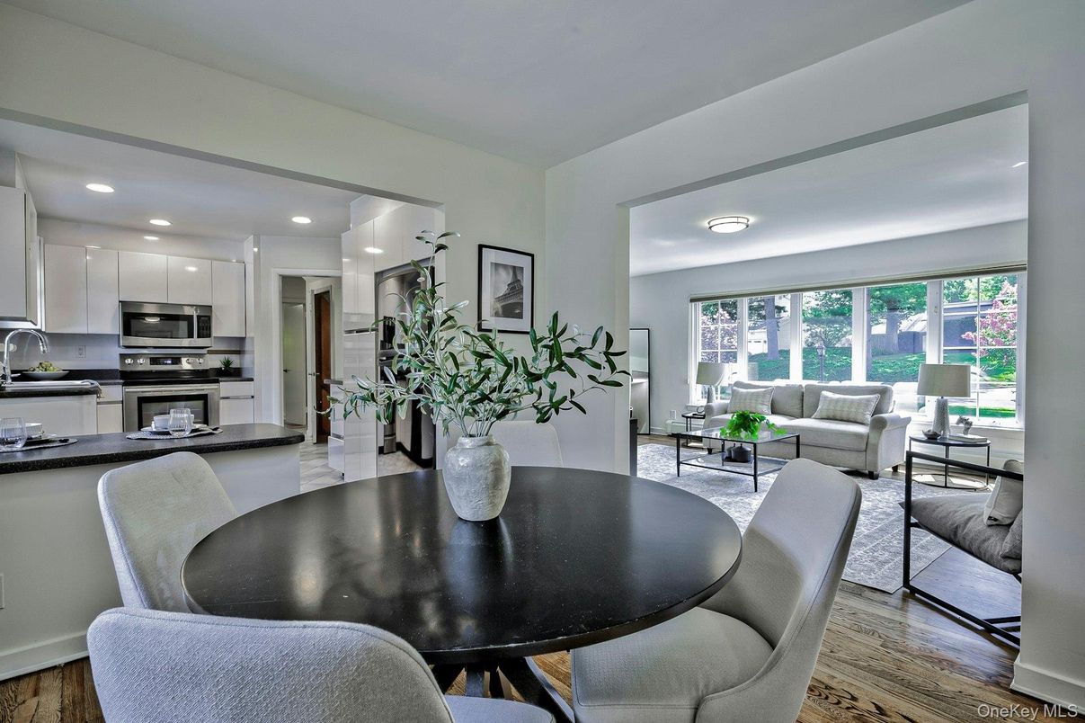 Dining room, Interior, Kitchen, Living room, Recessed Lighting, Stainless Steel Appliances, Wood Texture Flooring