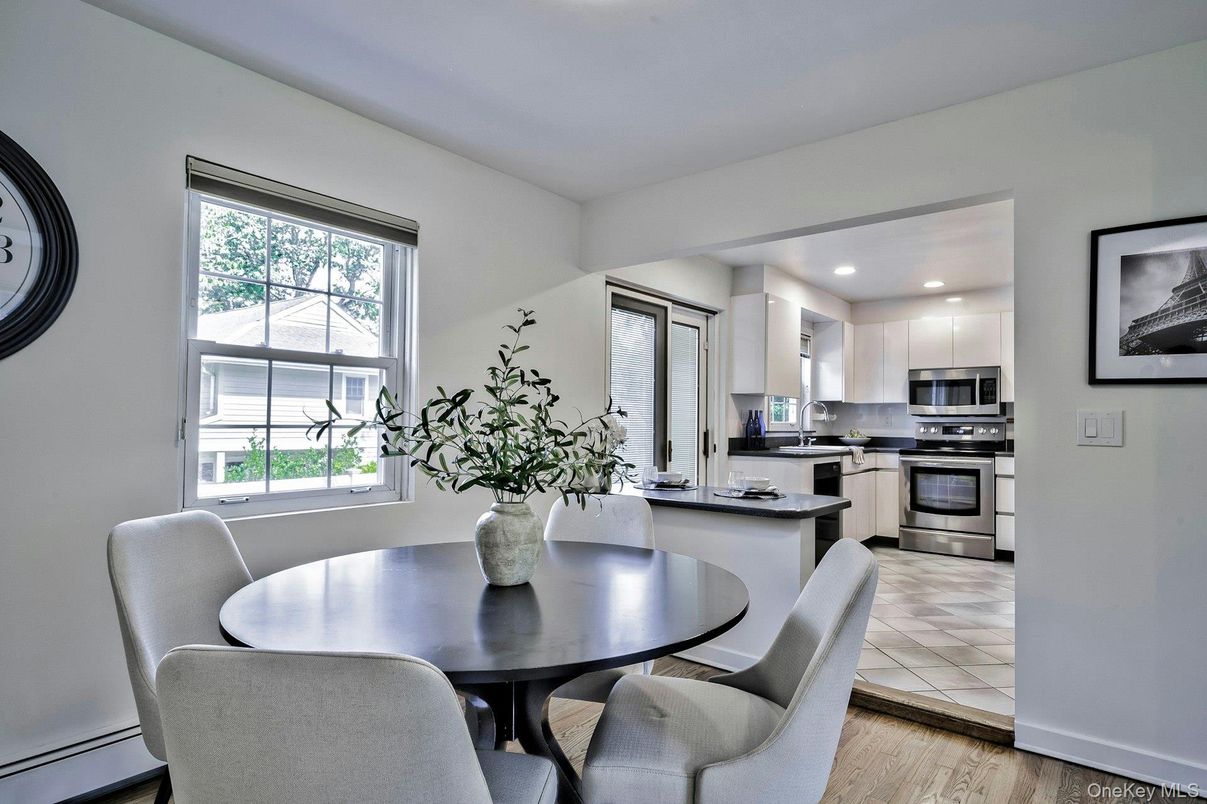 Dining room, Interior, Kitchen, Recessed Lighting, Stainless Steel Appliances, Wood Texture Flooring