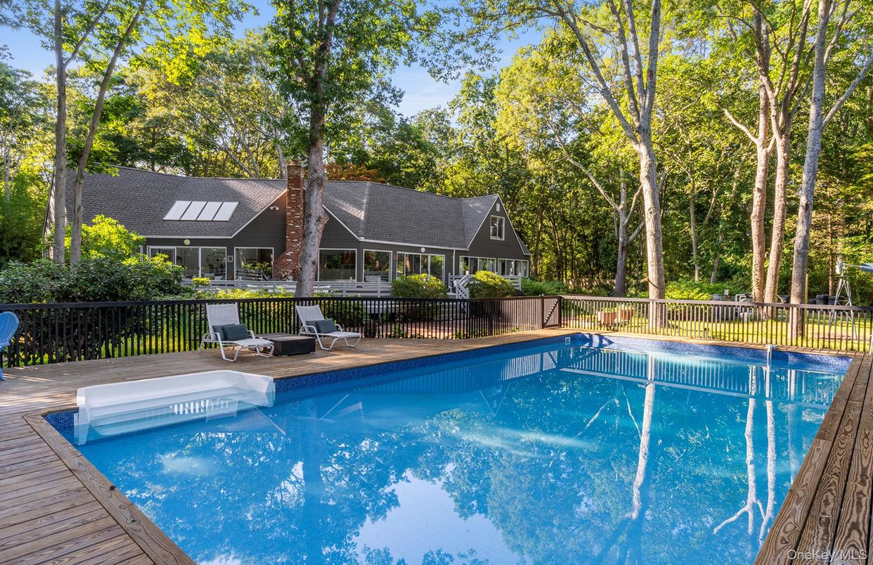 Exterior, Pool, Solar Panels