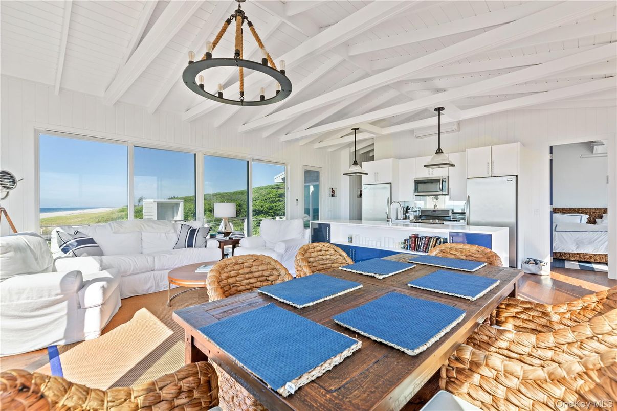 Dining room, Interior, Kitchen, Living room, Pendant Lights, Stainless Steel Appliances, Water, Wood Texture Flooring