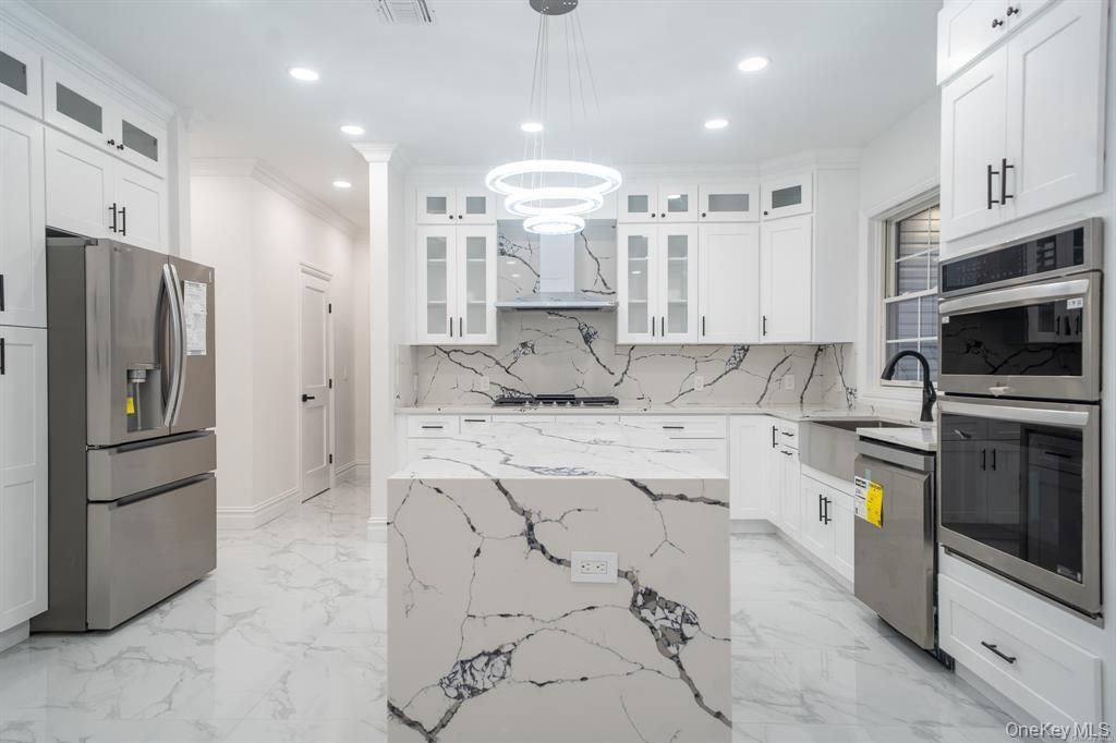 Interior, Kitchen, Marble, Marble Walls, Pendant Lights, Recessed Lighting, Stainless Steel Appliances