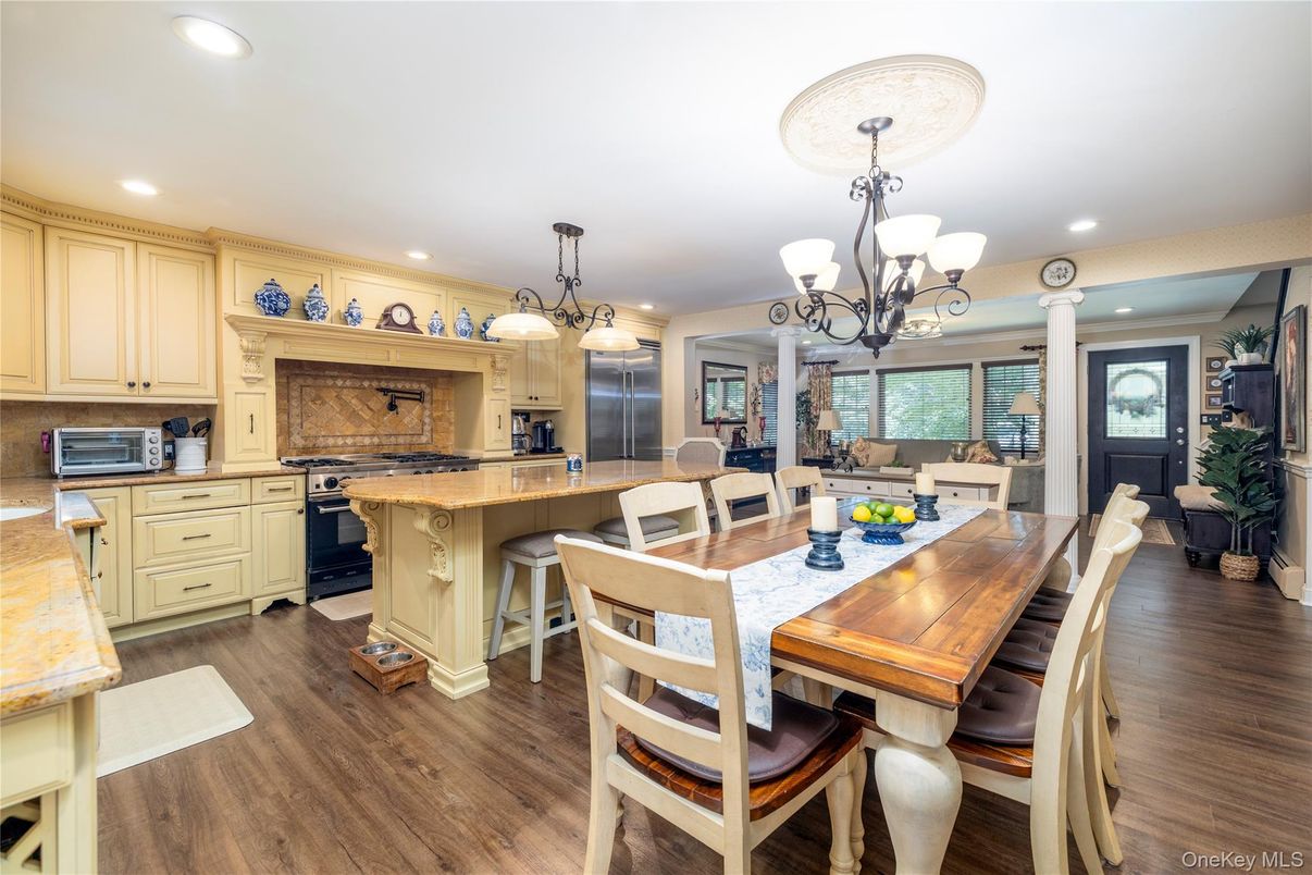 Chandelier, Dining room, Interior, Kitchen, Recessed Lighting, Stainless Steel Appliances, Wood Texture Flooring