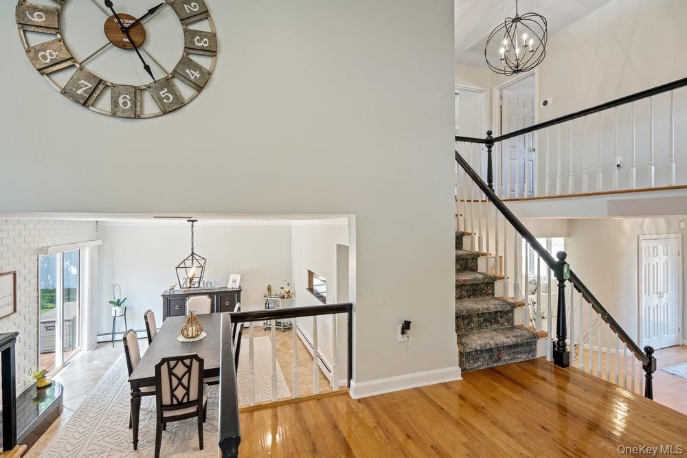 Chandelier, Dining room, Fireplace, Interior, Pendant Lights, Wood Texture Flooring