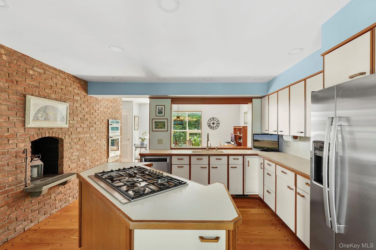 Fireplace, Interior, Kitchen, Recessed Lighting, Stone Walls, Wood Texture Flooring