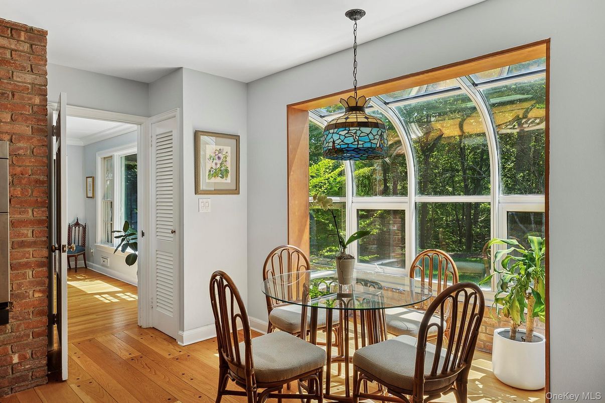 Dining room, Glass Ceilings, Interior, Pendant Lights, Stone Walls, Sun Room, Wood Texture Flooring