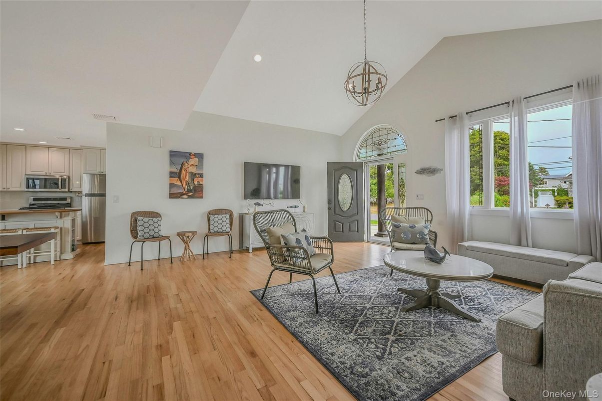 Chandelier, Interior, Kitchen, Living room, Recessed Lighting, Stainless Steel Appliances, Wood Texture Flooring