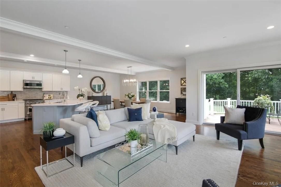 Dining room, Interior, Kitchen, Living room, Pendant Lights, Recessed Lighting, Stainless Steel Appliances, Wood Texture Flooring