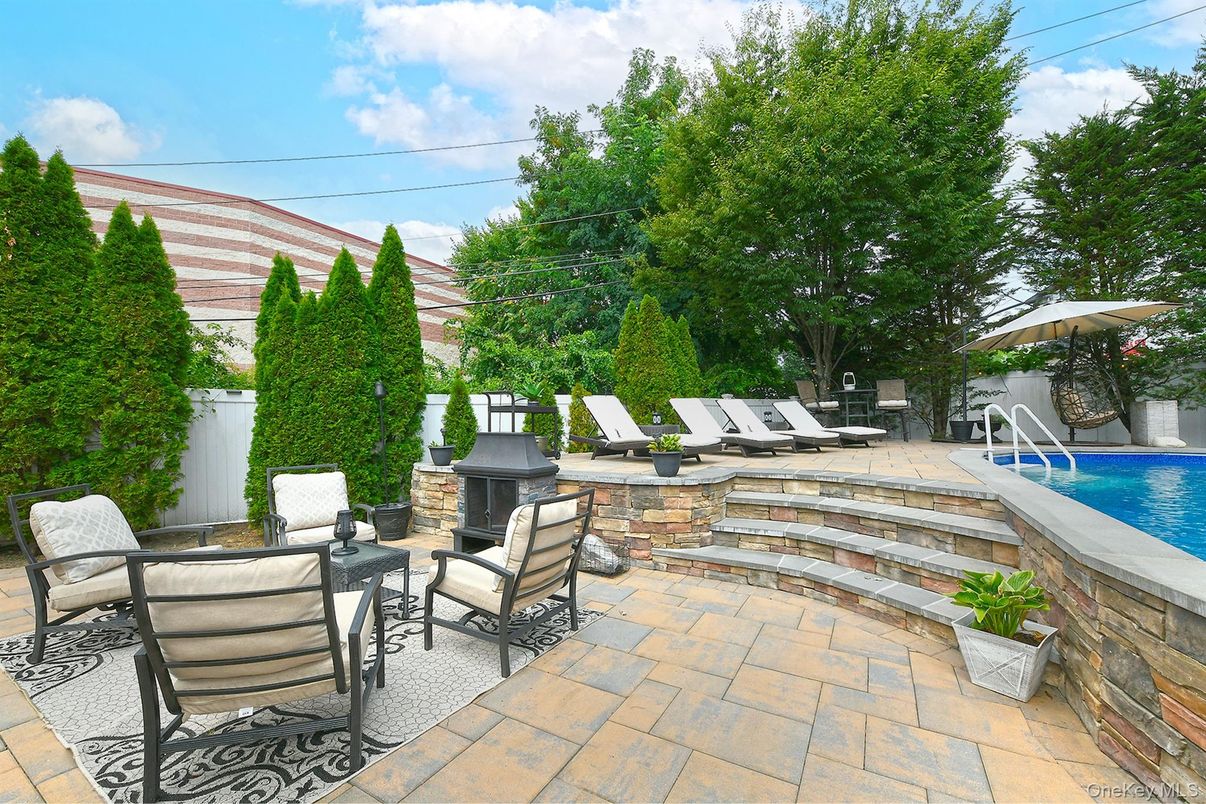 Exterior, Fireplace, Pool
