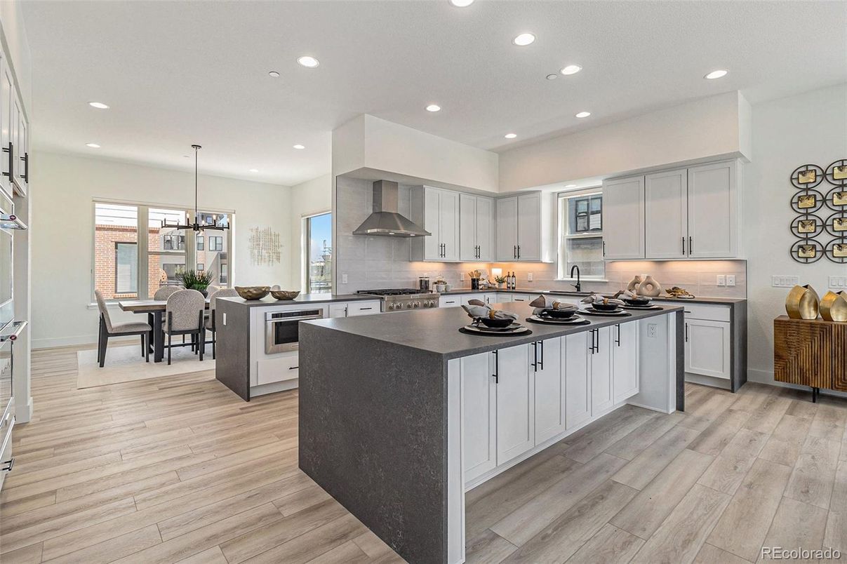 Dining room, Interior, Kitchen, Pendant Lights, Recessed Lighting, Stainless Steel Appliances, Wood Texture Flooring