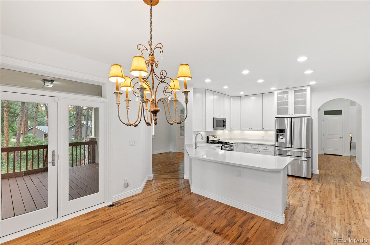 Chandelier, Interior, Kitchen, Recessed Lighting, Stainless Steel Appliances, Wood Texture Flooring