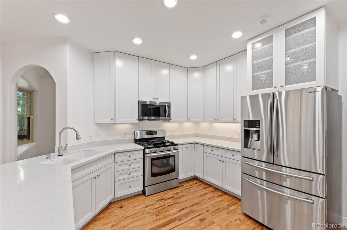 Interior, Kitchen, Recessed Lighting, Stainless Steel Appliances, Wood Texture Flooring