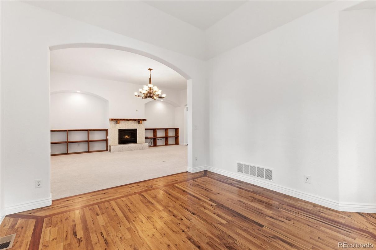 Chandelier, Empty room, Fireplace, Interior, Wood Texture Flooring