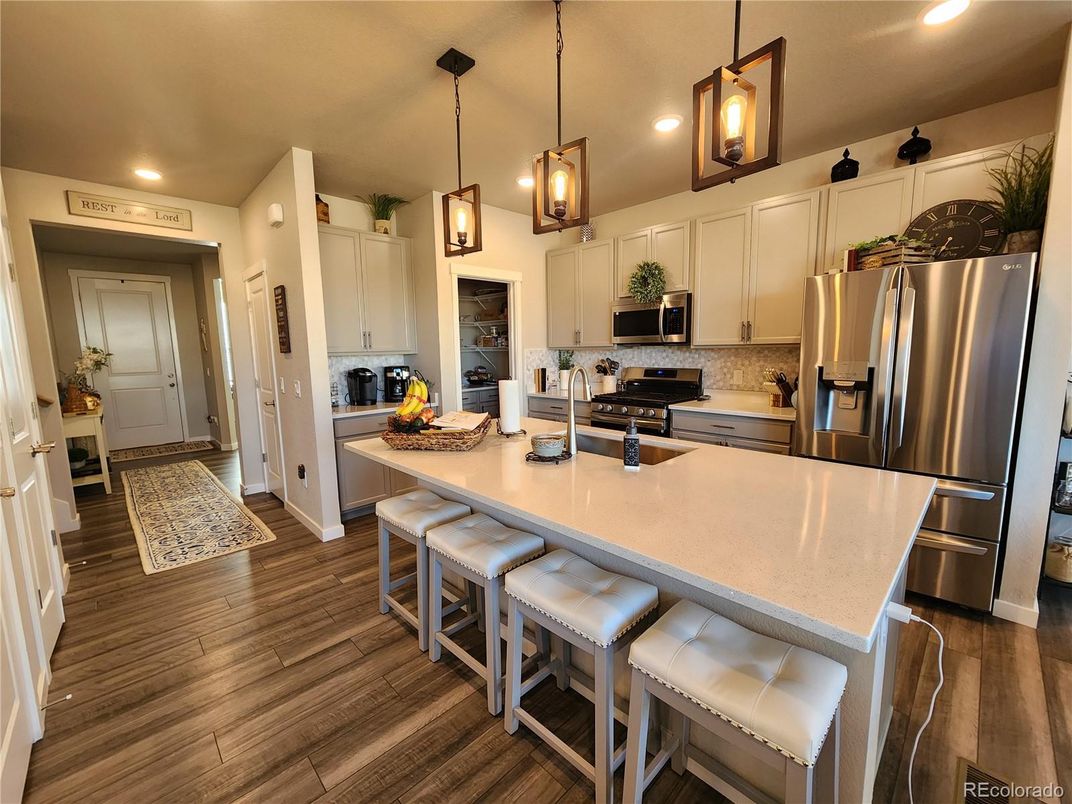 Interior, Kitchen, Pendant Lights, Recessed Lighting, Stainless Steel Appliances, Wood Texture Flooring