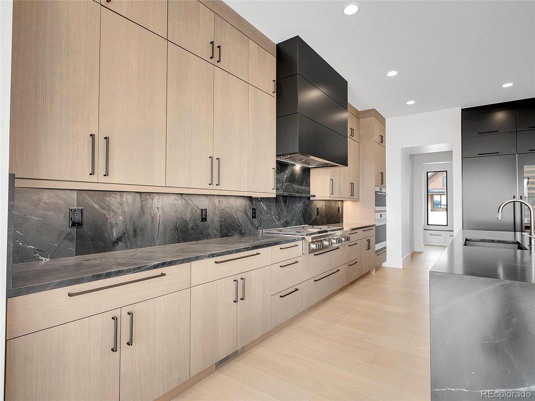 Interior, Kitchen, Marble Walls, Recessed Lighting, Wood Texture Flooring